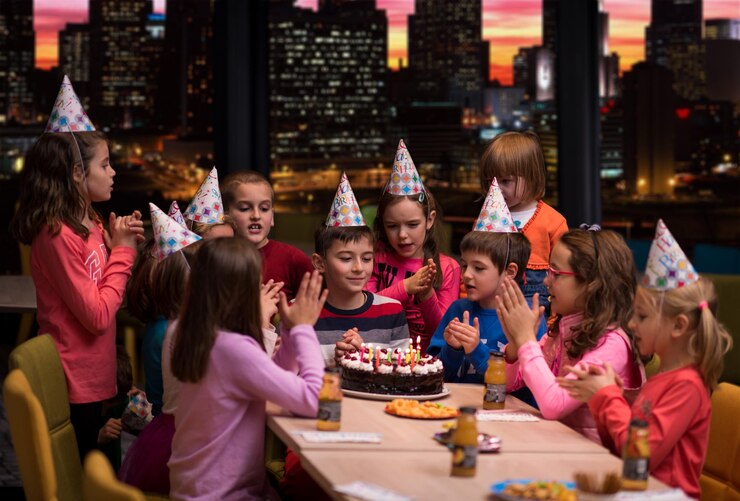 happy-young-boy-having-birthday-party_530697-97434